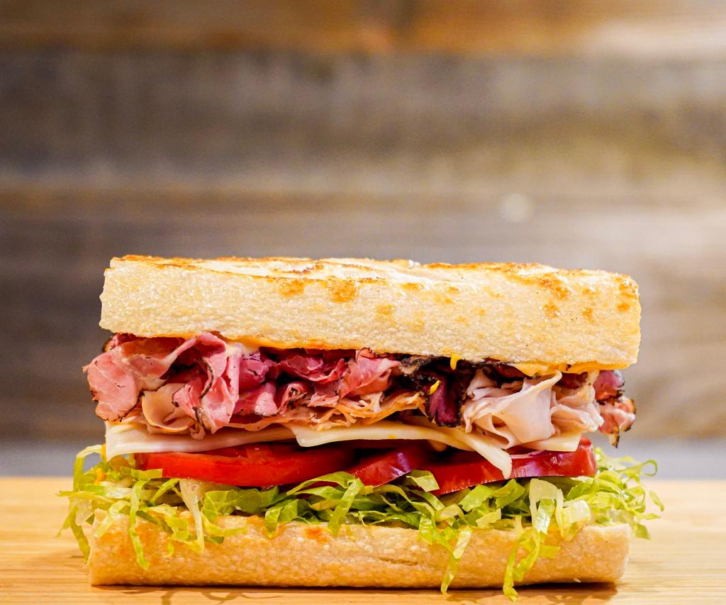 Pastrami and Turkey Sandwich · Lean, thinly sliced pastrami, oil browned turkey breast.