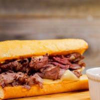 The French Dip · London broils roast beef with au jus served as a 6