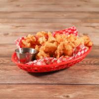 Cheese Curds · Straight from Ellsworth, Wl hand-battered and fried. Served with spicy ketchup.