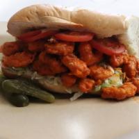 Banging Firecracker Shrimp Po'boy · Gulf shrimp tossed in a tangy & spicy hot sauce served on toasted French bread with lettuce,...