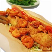 Seafood Po'boy · A mixture of our golden catfish and crispy gulf shrimp. poboy