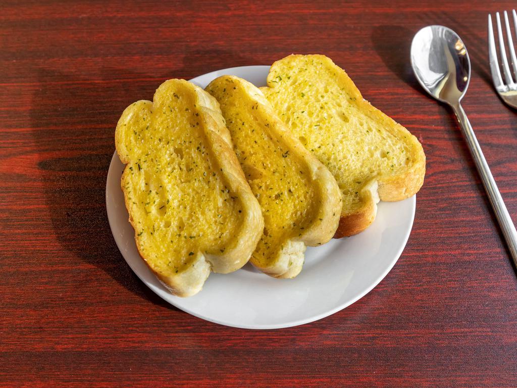Garlic Bread (2) · 2 pieces. Buttery bread that is topped with garlic. 