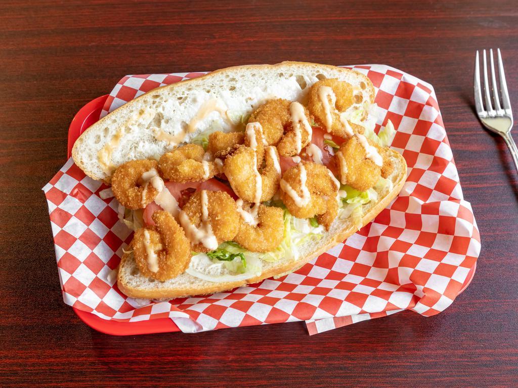 Shrimp Poboy Basket 8 Pieces · 8 shrimps battered in seasoned cornmeal and panko, mayo dressing, lettuce, tomatoes, pickles, 502 special sauce. Served with crispy fries, 2 hush puppies, ketchup.