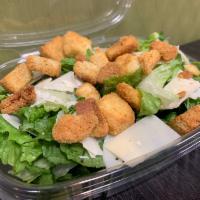 Caesar Salad · Crisp hand cut romaine lettuce with shaved aged Parmesan cheese and crunchy seasoned crouton...