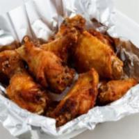Fresh Chicken Wings · Cooked wing of a chicken coated in sauce or seasoning.