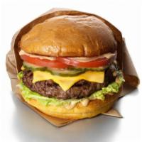 Cheeseburger · 1/4 lb. patty with lettuce, tomato, Thousand Island, caramelized onions and pickles.