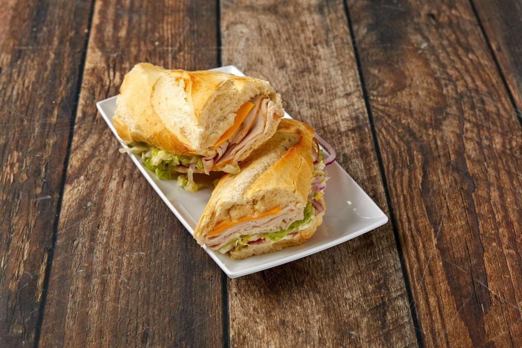 1. Turkey Breast Sandwich · Served with mayonnaise, dijon mustard, lettuce, tomatoes, pickles and onions.