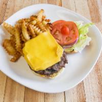 The burger with Fries · Make it your way, by adding cheddar cheese,  lettuce, tomatoes. Pickles. Onions 