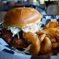 Crispy Fried Chicken Sandwich · Parmesan Crust, Coleslaw, 1,000 Island, Pickles. Served with fries.