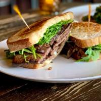 Short Rib · Braised Short Rib, Arugula, Grilled Onions, Pepper Jack, Grilled Sourdough. Served with fries.