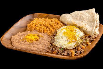 Steak Ranchero · 2 over easy eggs with carne asada and pico de gallo.