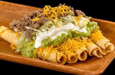 5 Rolled Tacos Cheese with Carne Asada · Shredded beef rolled tacos topped with guacamole, cheese, sour cream, carne asada, and lettuce.
