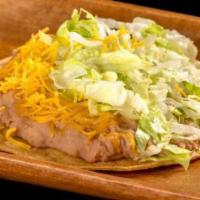 Bean Tostada · Refried beans, cheese, and lettuce.