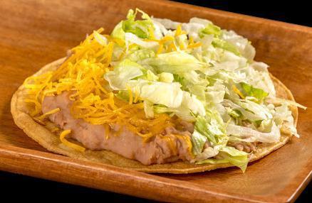 Bean Tostada · Refried beans, cheese, and lettuce.