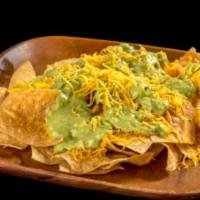 Chips with Guacamole · Corn tortilla chips, guacamole, and cheese.
