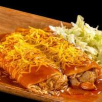 Chicken Enchilada · Shredded chicken in red sauce enchiladas topped with cheese and lettuce.