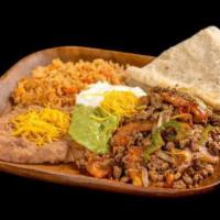 4. Fajitas Combo Plate · Chicken or steak mixed with onion, bell pepper, and tomato, topped with guacamole and sour c...