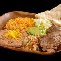 9. Carne Asada Combo Plate · Grilled steak topped with pico de gallo, guacamole, and lettuce. Comes with 1 flour tortilla.