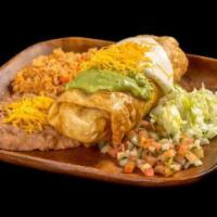 13. Chimichanga Combo Plate · Shredded beef or chicken burrito, deep fried, and topped with guacamole, sour cream, cheese,...