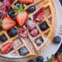 Homemade Waffles · Served with a side of fresh fruit salad.