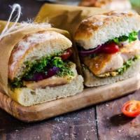 Pesto Chicken Sandwich · Grilled chicken, lettuce, tomatoes, onions and pesto.