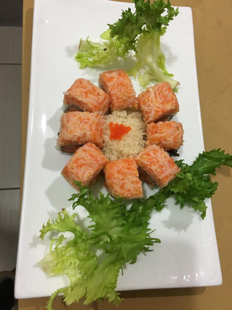 Dynamite Roll · Spicy crunch salmon inside with spicy crab on top.