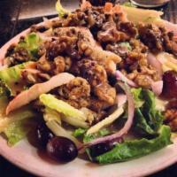 2. Blue Salad · Mixed greens, crumbled bleu cheese, candied walnuts, red grapes and red onions with a raspbe...