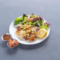 Baja Fish Tacos (2) · Flour tortillas with grilled mahi-mahi, napa cabbage, cilantro, avocado aioli, served with m...