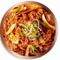 Dweji Bulgogi · Korean BBQ pork is marinated thinly pork grilled. Served with rice and kimchi.