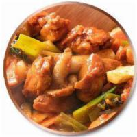 Dak Galbi · Stir-fried spicy sliced chicken, marinated with spicy pepper sauce. Stir-fried with cabbage,...
