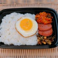 Yennal-dosirak (old-time dosirak) · Consists of bap (rice), stir-fried kimchi, fried achovies and pan-fried spam, fried eggs, an...