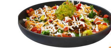 Taco Salad · Romaine lettuce, Gardein crumbles, tomatoes, croutons, shredded cheese, guacamole, sour cream, and taco sauce.