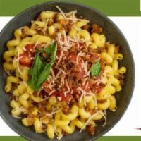 Cavatappi Pasta · Red sauce, mushrooms, onions, peppers, and Gardein crumbles on top of cavatappi noodles. Gar...
