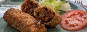 Loaded Burger Rolls · Beefless crumble, mushrooms, onions, and cheese fried in roll wraps. 2 per order. Served wit...
