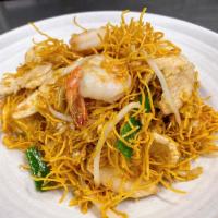 Crispy Noodle Pad Thai  · Crispy yellow noodle with beansprout, scallion, egg, peanut mixed in pad Thai sauce. contain...