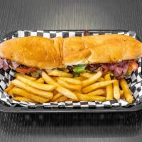 Pastrami & Cheese Sub · Served with mayo, lettuce, tomatoes, onions, and Italian dressing.