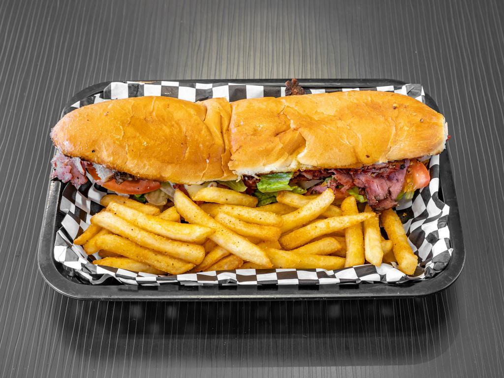 Pastrami & Cheese Sub · Served with mayo, lettuce, tomatoes, onions, and Italian dressing.