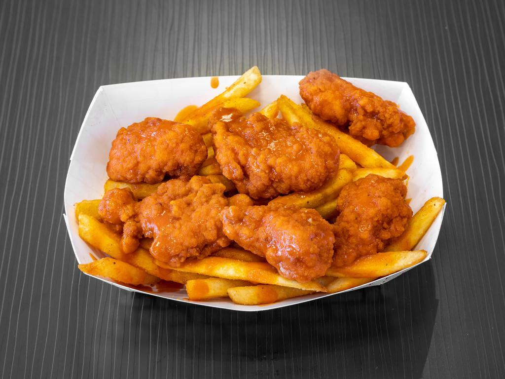 Buffalo Fries · 6 boneless wings topped with your choice of 1 flavor over fries and 1 2 oz. ranch.

