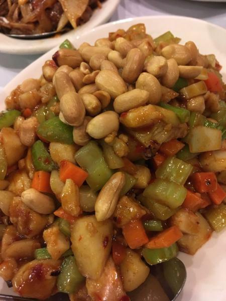 Kung Pao Chicken · A szechuan-inspired dish with chicken, peanuts, vegetables in spicy chilli sauce. Spicy.