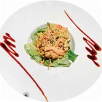 Spicy Crab Salad · Spicy crab over fresh lettuce and cucumber drizzled with spicy mayo.