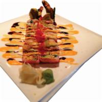 Tokyo Love Story Roll · Shrimp tempura, lobster salad, asparagus, pineapple, avocado, wrapped in pink soy paper topp...