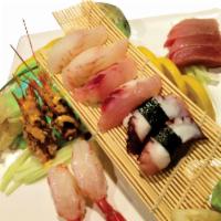 Sashimi Regular · 12 pieces of premium fish.  Raw.