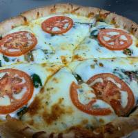 Deep Dish Tomato Pizza · A deep dish style of our thin stuffed with your favorite ingredients topped with mozzarella ...