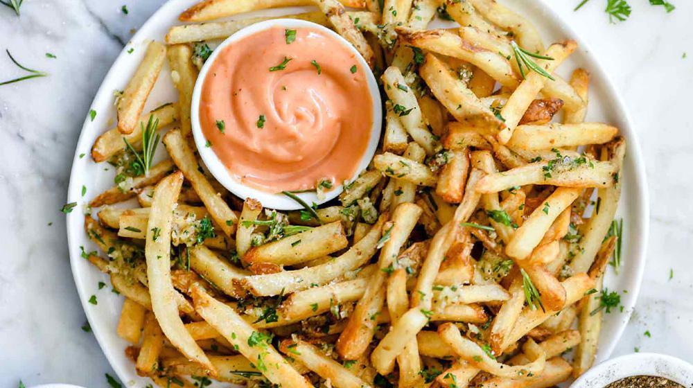 Garlic Parmesan Fries Plate · Herbs, garlic, dry parsley, Parmesan cheese with aioli smoked dipping sauce.