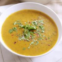 Lentil Soup · Large cup of lentil soup, onions and parsley with amazing flavors and spices. Side of roaste...