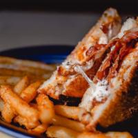 Mega Grilled Cheese Sandwich · Cheddar, bacon, whipped ricotta, swiss, cheese curds on toasted wheat.