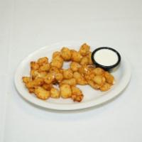 Cheese Curds · Fresh Wisconsin cheese curds breaded 
and deep fried, served with ranch 
dressing.