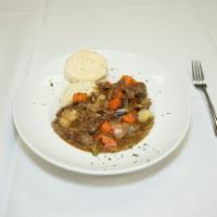 Hunter's Pot Roast · Braised beef pot roast with carrots, 
mushrooms, onions, and red potatoes in a Guinness gra...