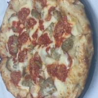 The Capone · Mozzarella, provolone, meatballs, and pepperoni.  Topped with sauce, fresh garlic, and parme...