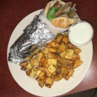 Gyro Sandwich Combo with Drink · Thin slices of the roasted meat blend of beef and lamb cooked on a rotisserie. Served on a w...